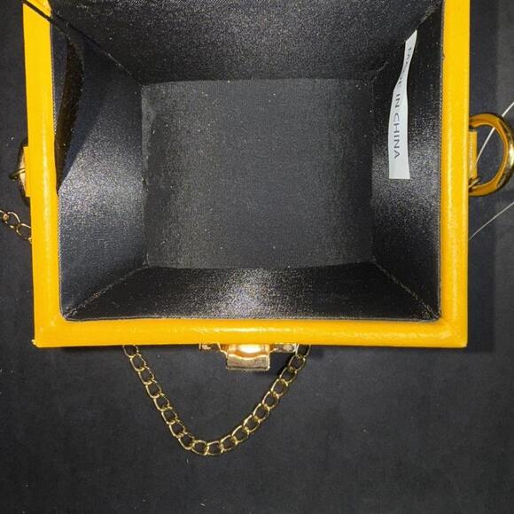 Stylish mini structured box crossbody purse in vibrant mustard yellow. - Picture 8 of 8